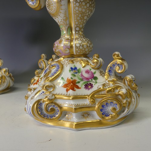 124 - A good pair of late 19thC ornate continental porcelain Vases, probably French, of two-handled oval f... 