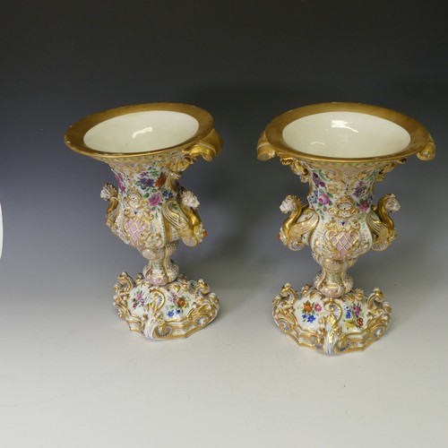 124 - A good pair of late 19thC ornate continental porcelain Vases, probably French, of two-handled oval f... 