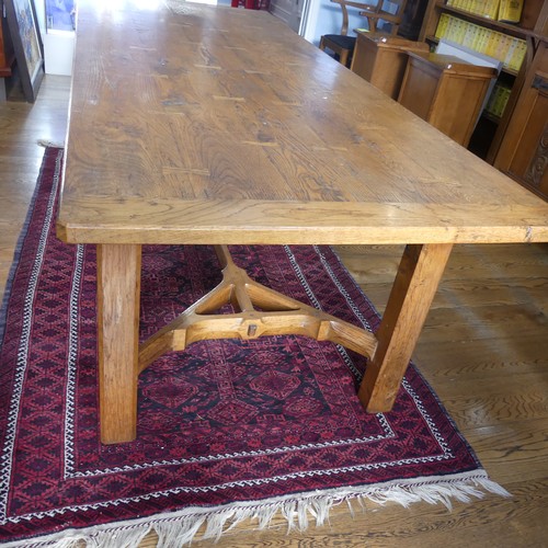 469 - A craftsman made oak table with peg construction, table top made of 5 planks together with cleated e... 