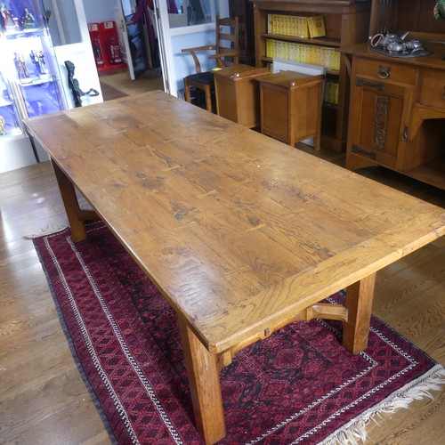 469 - A craftsman made oak table with peg construction, table top made of 5 planks together with cleated e... 