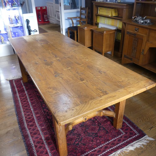 469 - A craftsman made oak table with peg construction, table top made of 5 planks together with cleated e... 