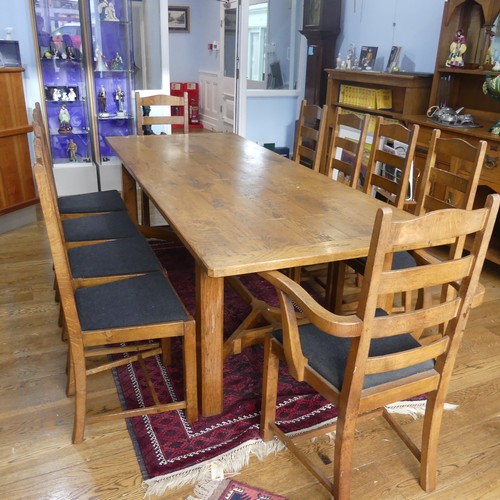 469 - A craftsman made oak table with peg construction, table top made of 5 planks together with cleated e... 