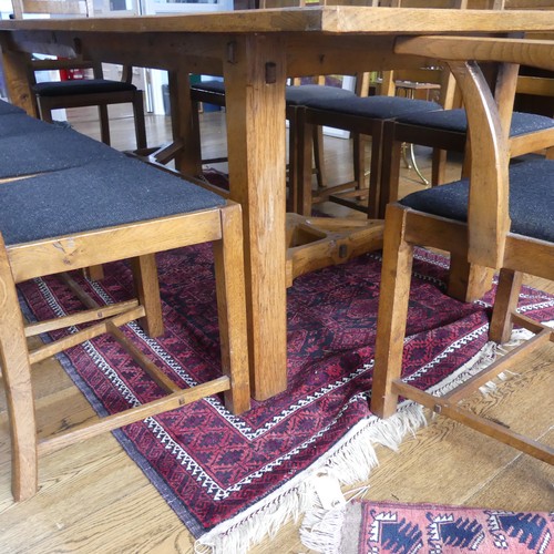 469 - A craftsman made oak table with peg construction, table top made of 5 planks together with cleated e... 