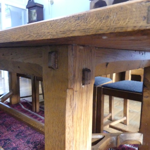 469 - A craftsman made oak table with peg construction, table top made of 5 planks together with cleated e... 