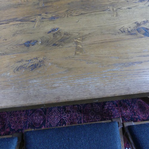 469 - A craftsman made oak table with peg construction, table top made of 5 planks together with cleated e... 