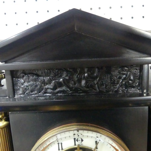 263 - A late Victorian black slate Mantel Clock, of architectural form with gilt metal columns and finials... 