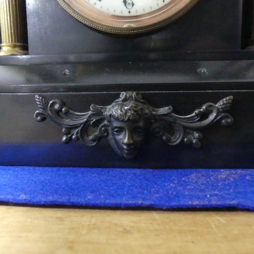 263 - A late Victorian black slate Mantel Clock, of architectural form with gilt metal columns and finials... 