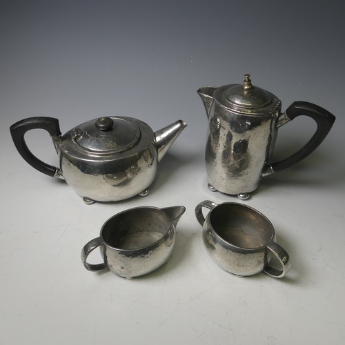 441 - A Tudric pewter three-piece tea set, together with a pewter four-piece coffee service and a Christop... 