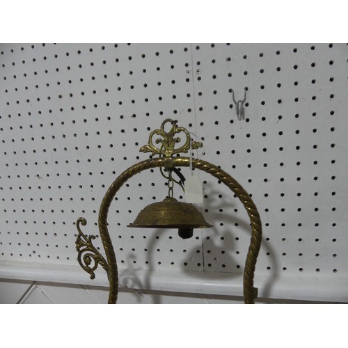 303 - A Victorian hanging brass Oil Lamp, having a cranberry glass font and shade, one brass ornament brok... 