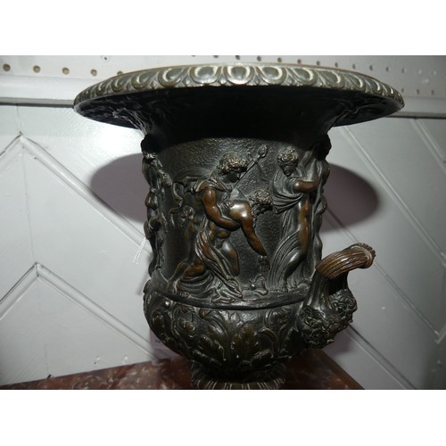 310 - A good decorative bronze Campagna Urn, decorated in relief with neoclassical dancing figures and mus... 