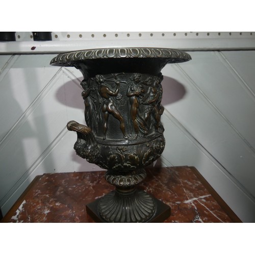 310 - A good decorative bronze Campagna Urn, decorated in relief with neoclassical dancing figures and mus... 