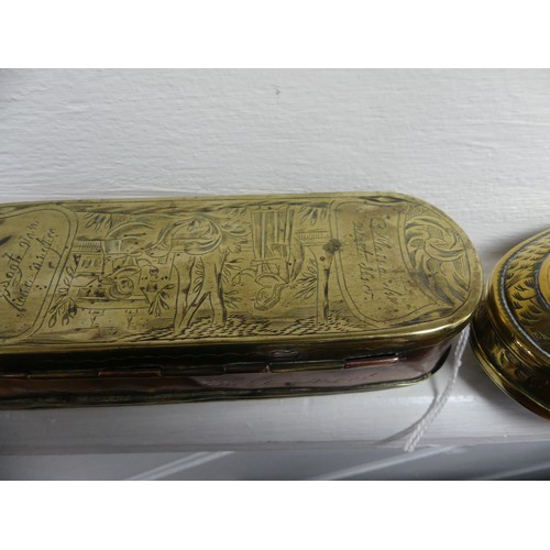 312 - An 18thC Dutch brass Tobacco Box, of oval form with hinged cover, typical figural engraved decoratio... 