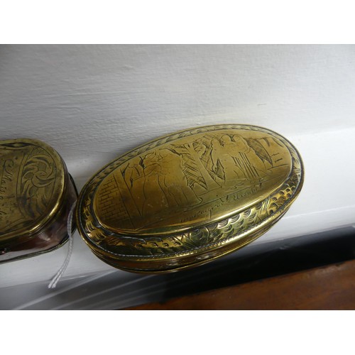 312 - An 18thC Dutch brass Tobacco Box, of oval form with hinged cover, typical figural engraved decoratio... 