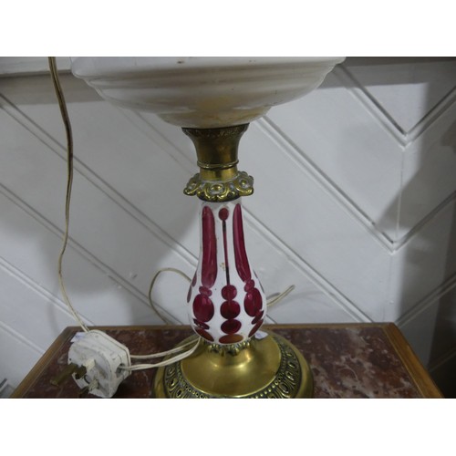 326 - A Victorian overlaid glass Oil Lamp, converted to electricity, with shade, on brass base, H 55cm.... 