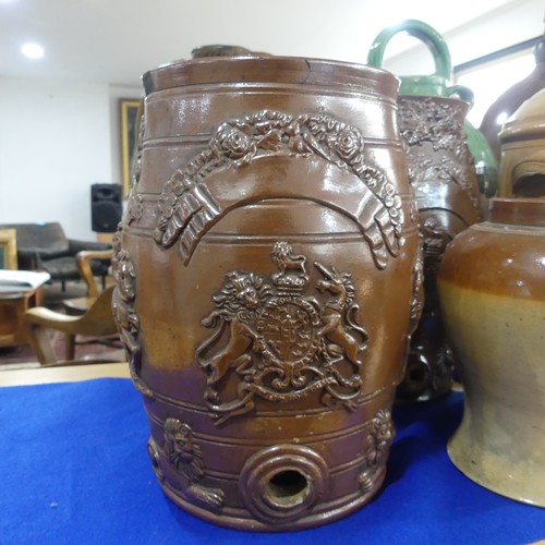 44 - A pair of 19thC salt glazed stoneware Barrels, 30cm high, together with four other saltglazed jars a... 