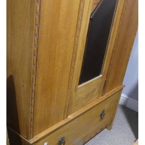 410 - An early 20thC honey-coloured oak single Wardrobe, W 104cm x H 192cm x D 45cm