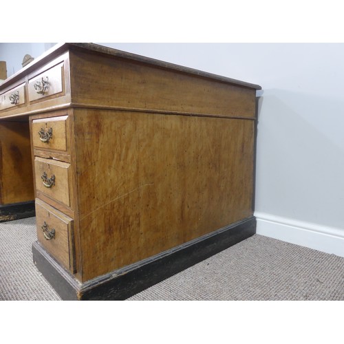 270 - An Edwardian oak twin Pedestal Desk, the tooled leather top above three frieze drawers with three fu... 