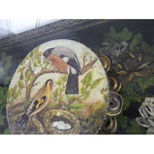 433 - A vintage wooden Tambourine, the skin painted with birds and nest of eggs, 23cm diameter.... 