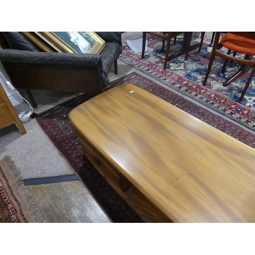 456 - An Ercol dark blonde Windsor Minerva Coffee Table, with two drawers and open display section, raised... 