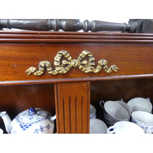 461 - A 20thC mahogany open Bookcase, in the Louis XVI style, with adjustable shelves and gilt metal mount... 