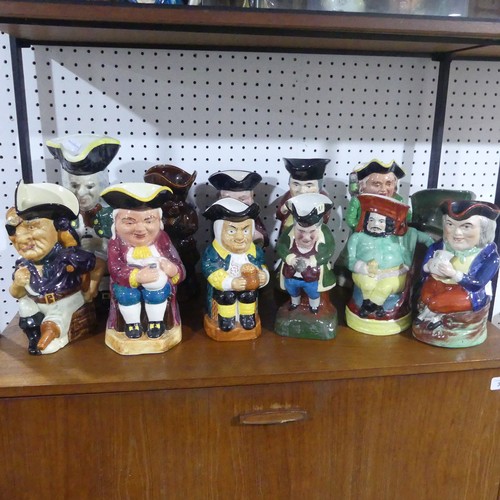 75 - A collection of thirty four various decorative Toby Jugs (a lot)