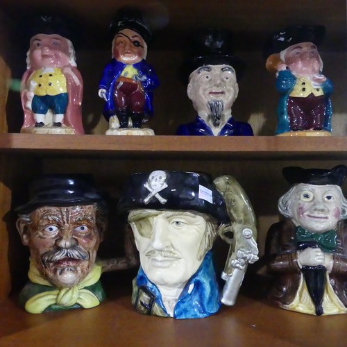 75 - A collection of thirty four various decorative Toby Jugs (a lot)