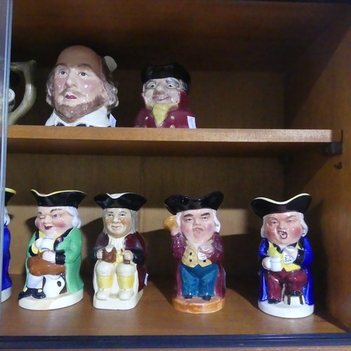 75 - A collection of thirty four various decorative Toby Jugs (a lot)