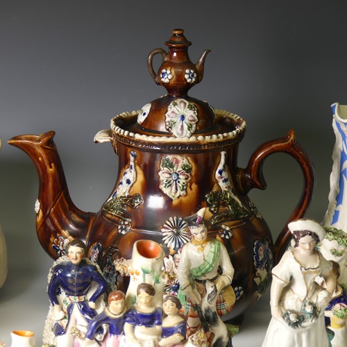 50 - A large Victorian Bargeware Teapot, decorated in typical style, together with a Meigh & Sons Jug... 