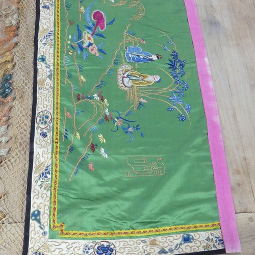 165 - Two early 20thC Chinese Silk Hangings: a green silk panel embroidered with figures in garden scene, ... 