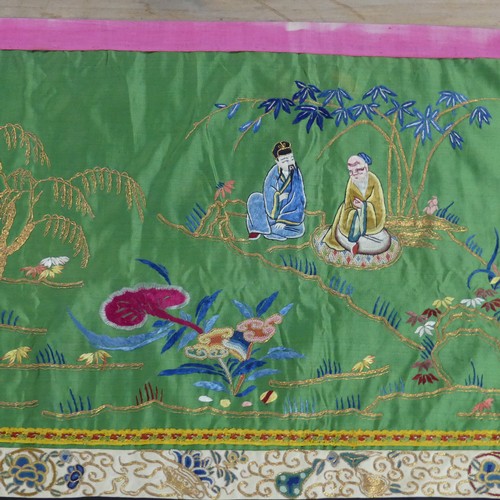 165 - Two early 20thC Chinese Silk Hangings: a green silk panel embroidered with figures in garden scene, ... 