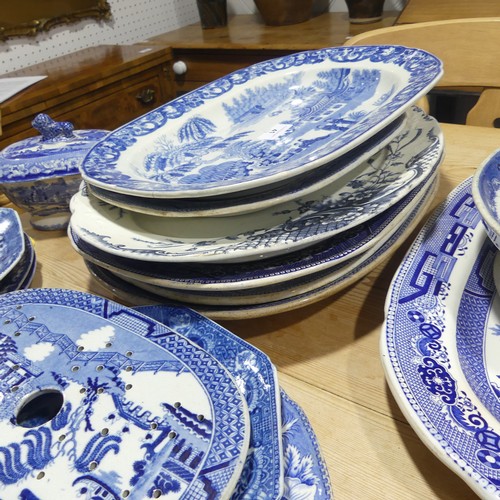 41 - A large quantity of antique Staffordshire willow pattern Meat Platters, comprising ten, largest L 48... 