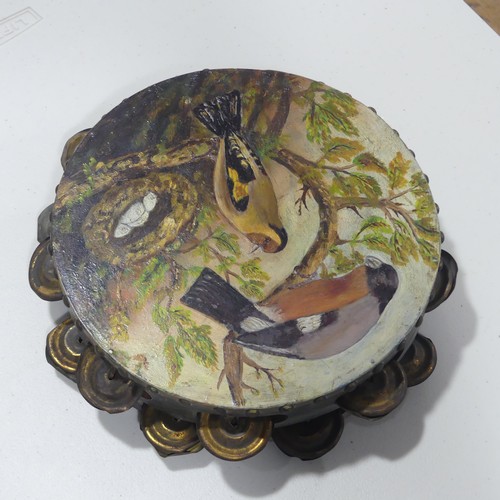 433 - A vintage wooden Tambourine, the skin painted with birds and nest of eggs, 23cm diameter.... 