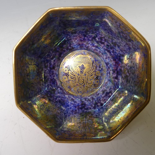 82 - A faceted Wedgwood lustre Bowl, with gilded exterior decoration and internal central gilt motif, fac... 