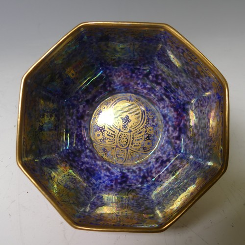 82 - A faceted Wedgwood lustre Bowl, with gilded exterior decoration and internal central gilt motif, fac... 