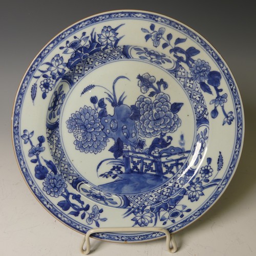 159 - A near pair of 19thC Chinese blue and white Plates, with underglaze floral decoration and floral blo... 