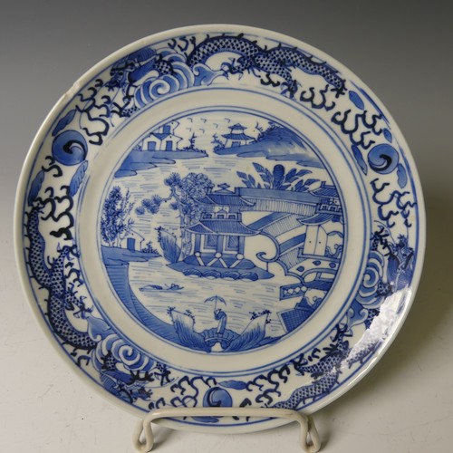 159 - A near pair of 19thC Chinese blue and white Plates, with underglaze floral decoration and floral blo... 