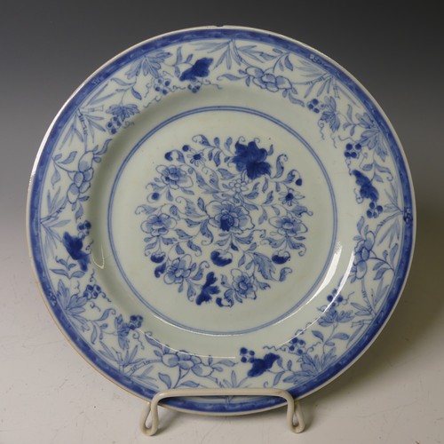 159 - A near pair of 19thC Chinese blue and white Plates, with underglaze floral decoration and floral blo... 