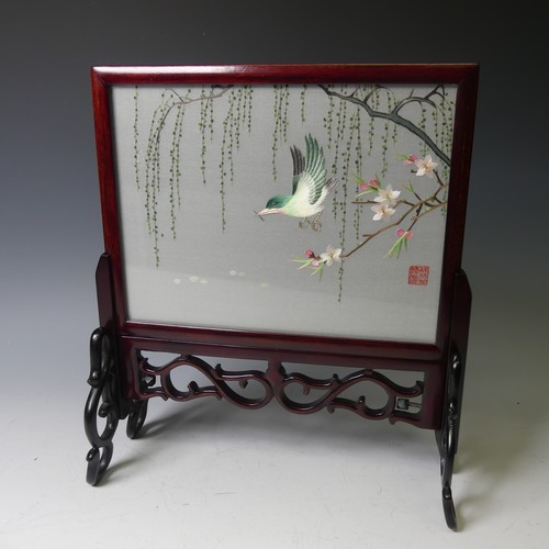 163 - A mid-20thC Chinese hardwood Table Screen, with silk panel depicting a bird among flowers, 32cm over... 