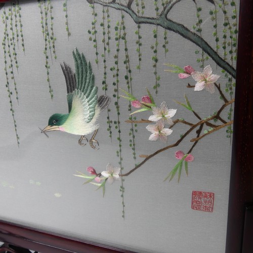 163 - A mid-20thC Chinese hardwood Table Screen, with silk panel depicting a bird among flowers, 32cm over... 