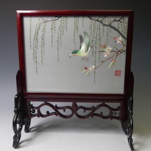 163 - A mid-20thC Chinese hardwood Table Screen, with silk panel depicting a bird among flowers, 32cm over... 