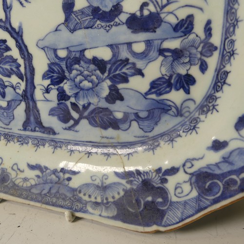 134 - An antique Chinese porcelain blue and white Bowl, with scalloped edge, depicting mountainous scenes,... 