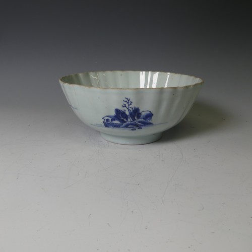 134 - An antique Chinese porcelain blue and white Bowl, with scalloped edge, depicting mountainous scenes,... 