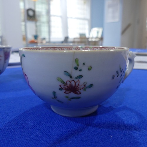 154 - A pair of 19thC Chinese famille rose porcelain Teabowls, decorated in enamels of flora, D 8cm, with ... 