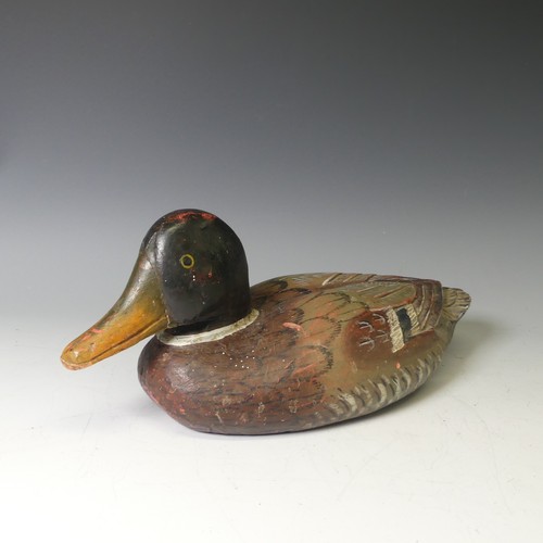 344 - A vintage carved and painted wooden Decoy Duck, modelled as a mallard, L 37cm, together with two oth... 