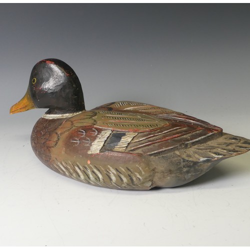 344 - A vintage carved and painted wooden Decoy Duck, modelled as a mallard, L 37cm, together with two oth... 