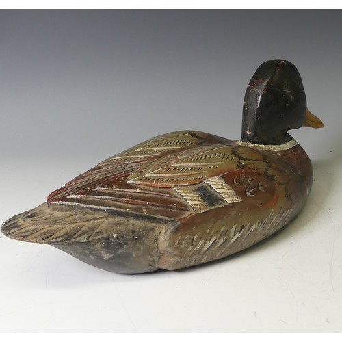 344 - A vintage carved and painted wooden Decoy Duck, modelled as a mallard, L 37cm, together with two oth... 