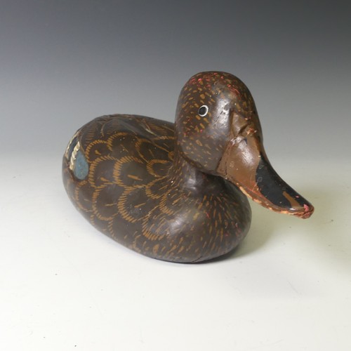 344 - A vintage carved and painted wooden Decoy Duck, modelled as a mallard, L 37cm, together with two oth... 