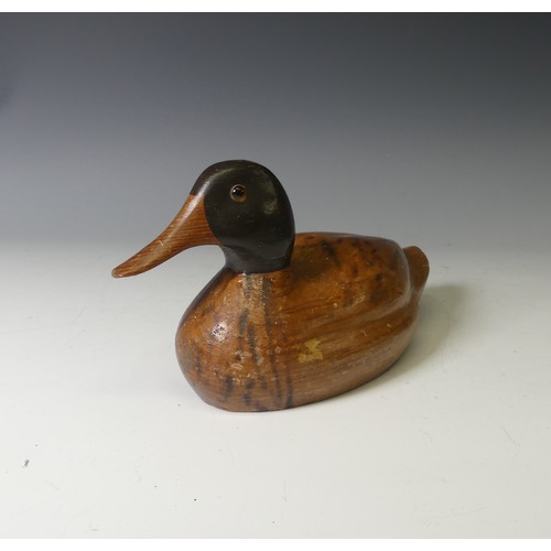 344 - A vintage carved and painted wooden Decoy Duck, modelled as a mallard, L 37cm, together with two oth... 