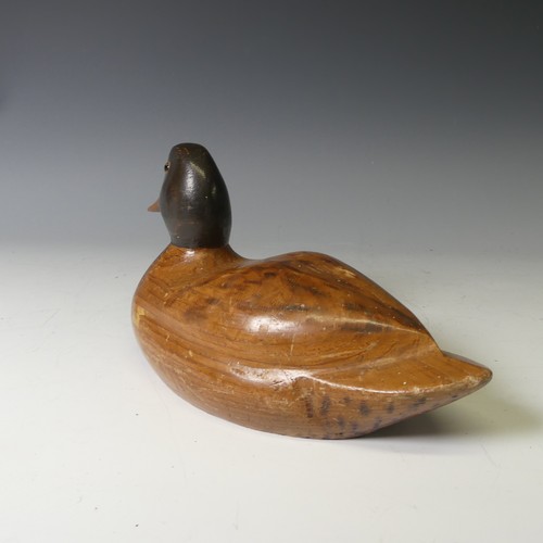 344 - A vintage carved and painted wooden Decoy Duck, modelled as a mallard, L 37cm, together with two oth... 