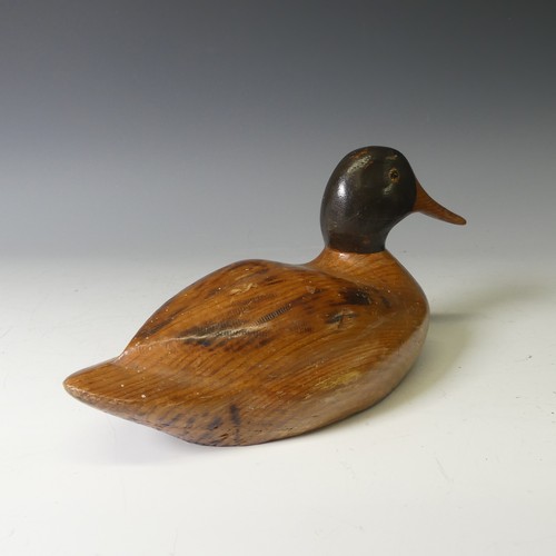 344 - A vintage carved and painted wooden Decoy Duck, modelled as a mallard, L 37cm, together with two oth... 